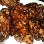 Dak Kang Jung wif black sesame seeds