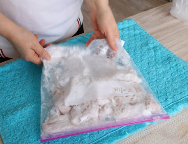 Coat chicken with starch