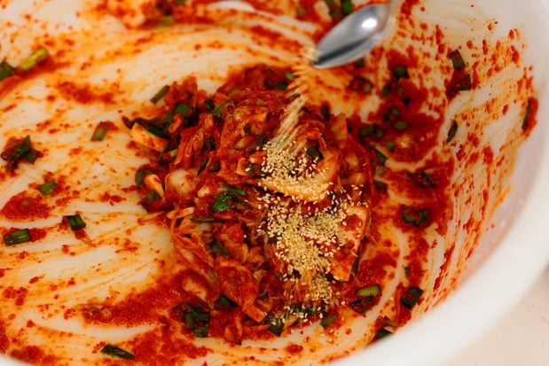 Fresh kimchi sprinkled with toasted sesame seeds