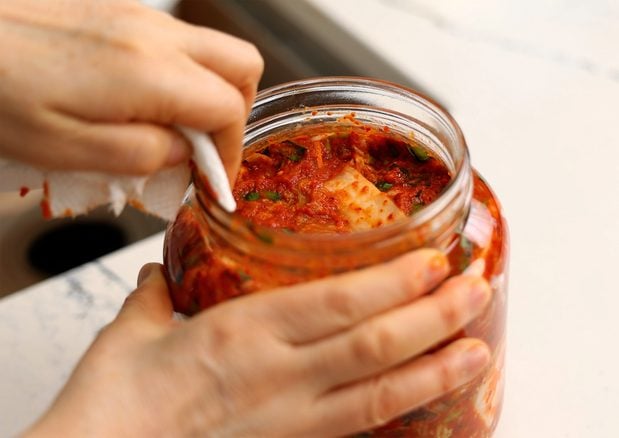 add kimchi to a jar